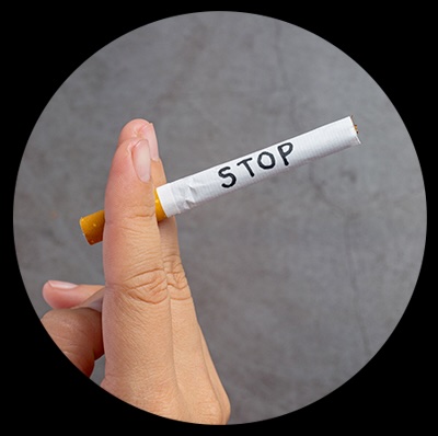 cigarette notée STOP dessus